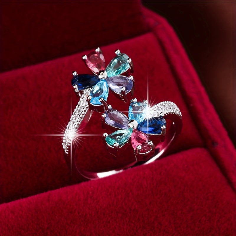 Bague en cuivre avec placage blanc K et zircon synthétique.