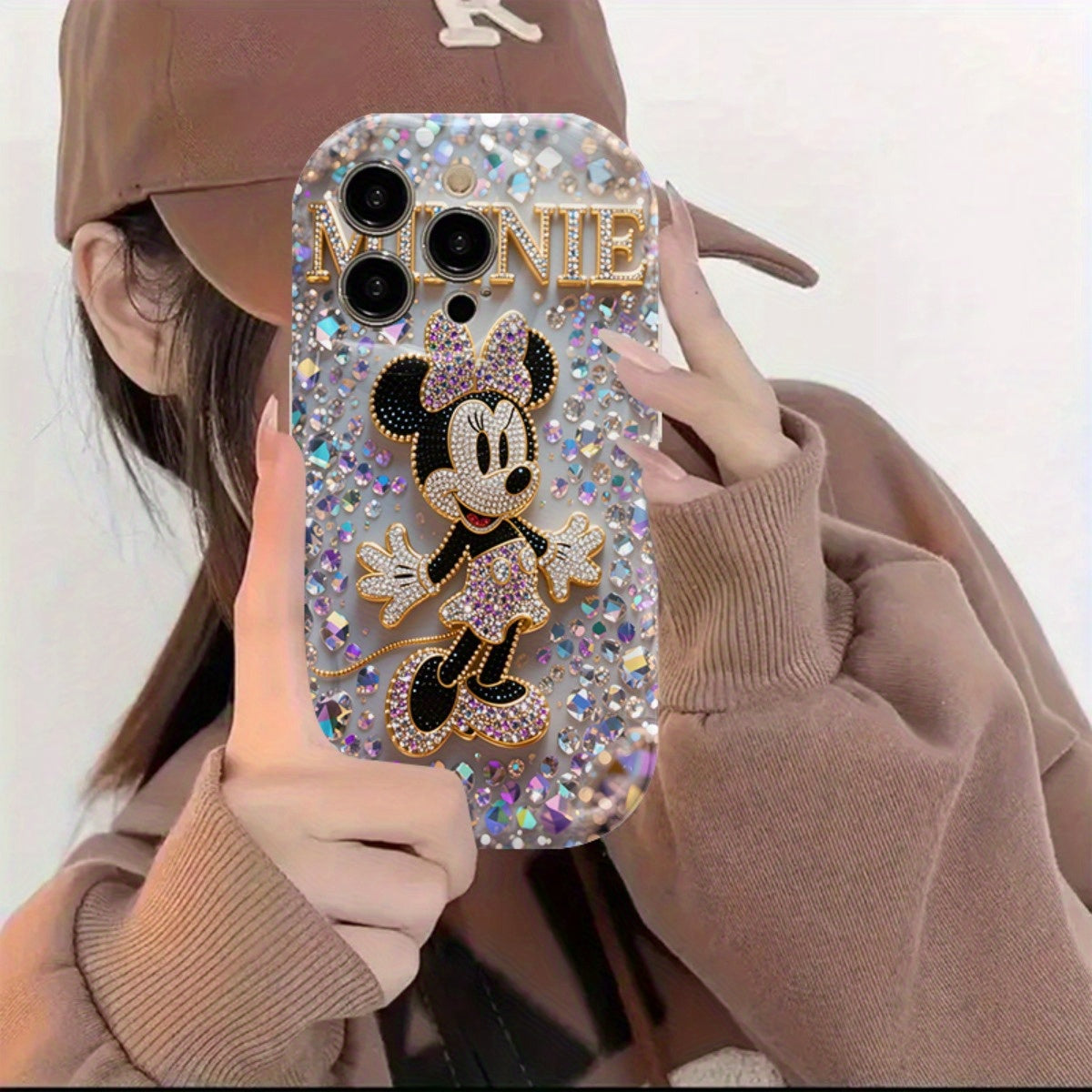 Une coque de téléphone sous licence Disney avec un design en strass, IPHONE - Topdecheztop.fr