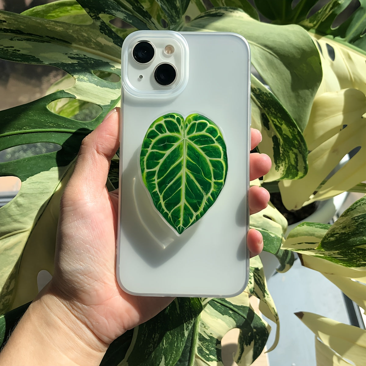 Support de téléphone en forme de feuille de plante tropicale