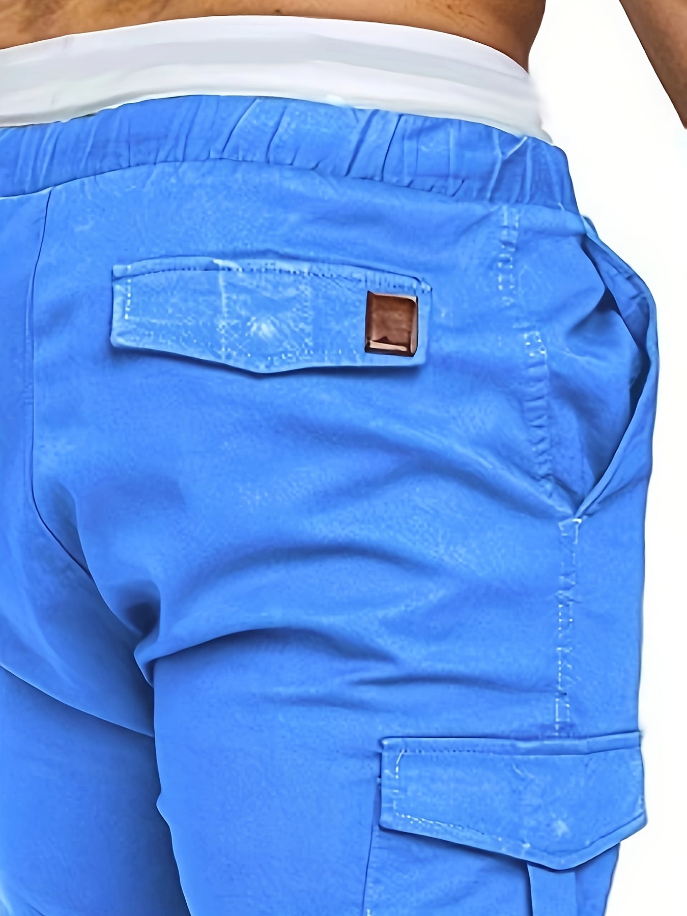 Pantalon cargo robuste pour homme avec design multi-poches, taille réglable