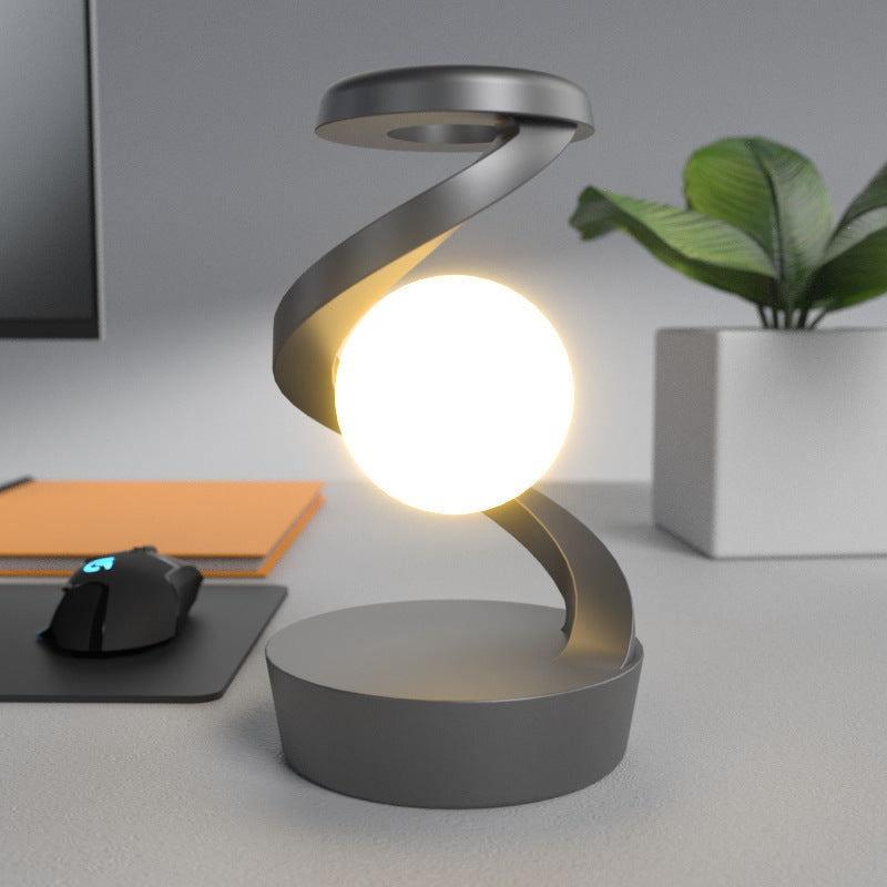 Lampe de bureau rotative en forme de lune avec capteur de charge sans fil pour téléphone