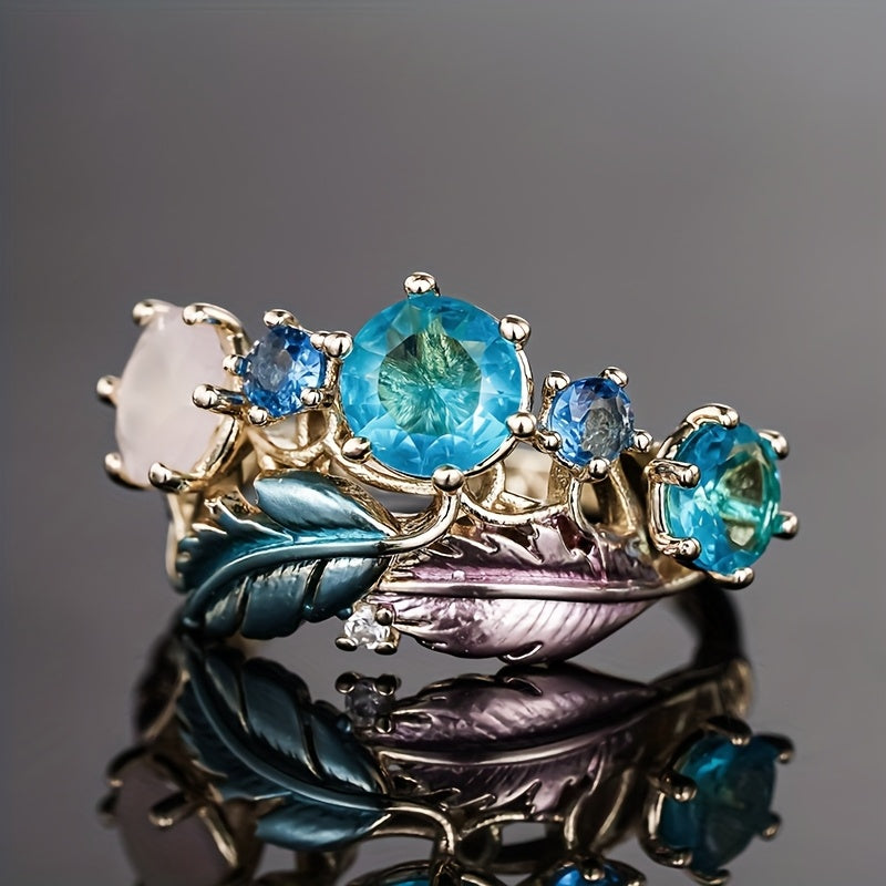 Bague unique en forme de plume de vigne dorée