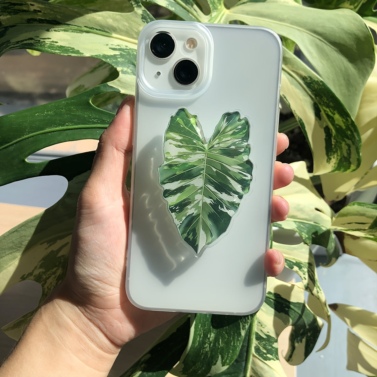 Support de téléphone en forme de feuille de plante tropicale