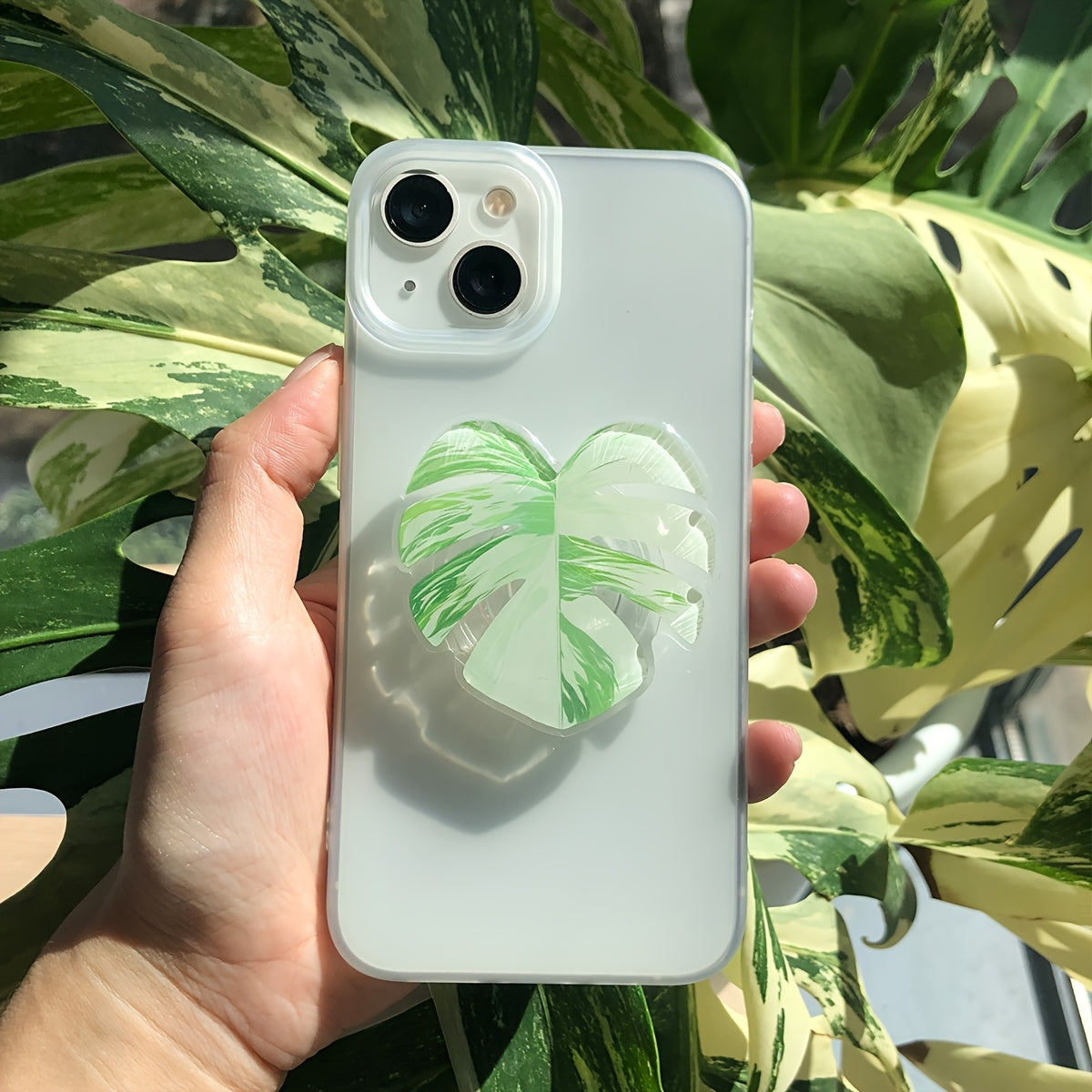 Support de téléphone en forme de feuille de plante tropicale