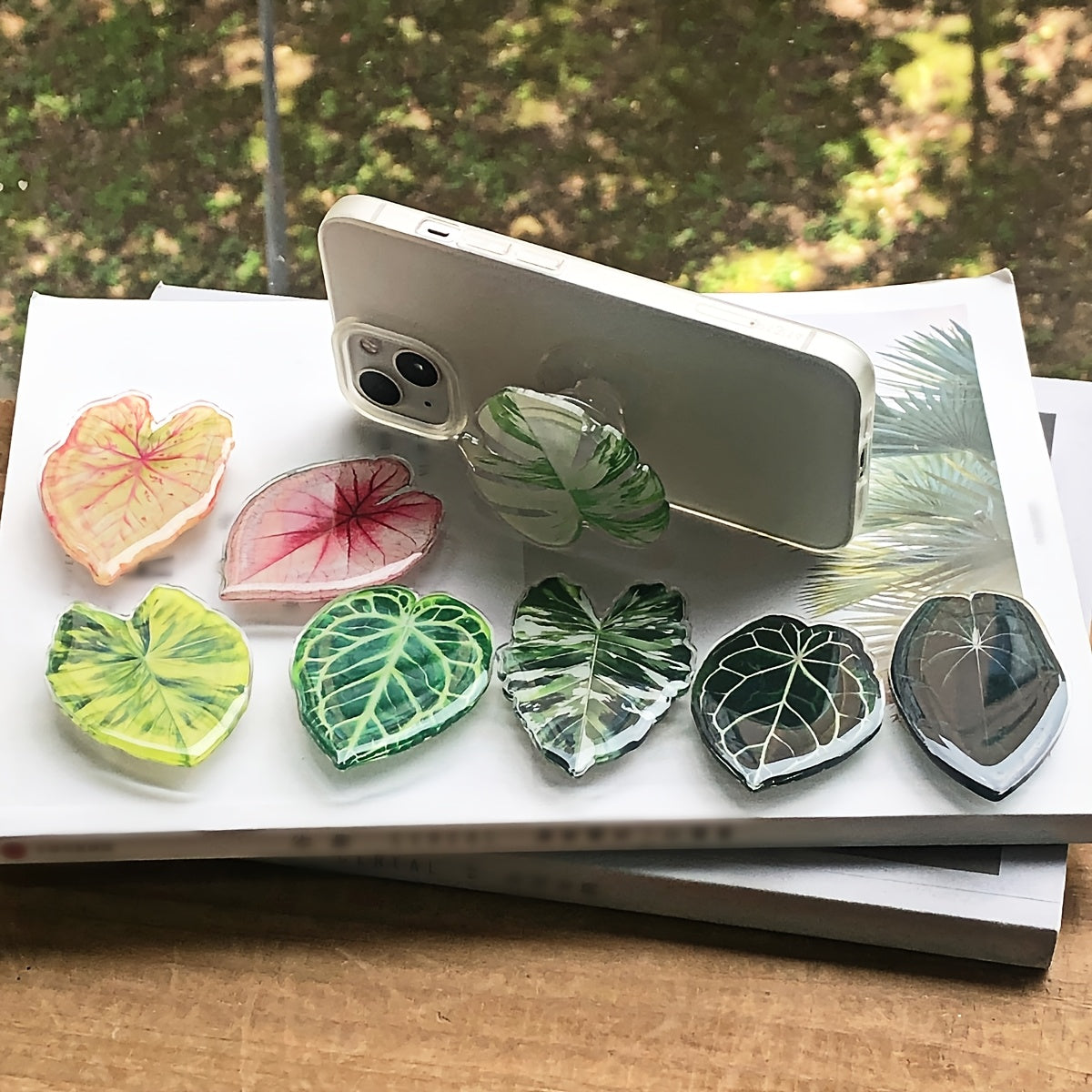 Support de téléphone en forme de feuille de plante tropicale