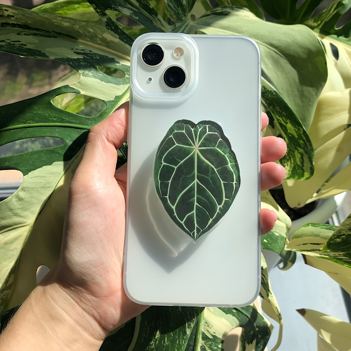Support de téléphone en forme de feuille de plante tropicale