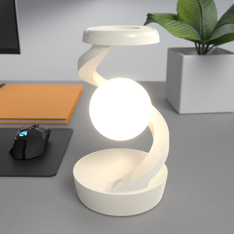 Lampe de bureau rotative en forme de lune avec capteur de charge sans fil pour téléphone