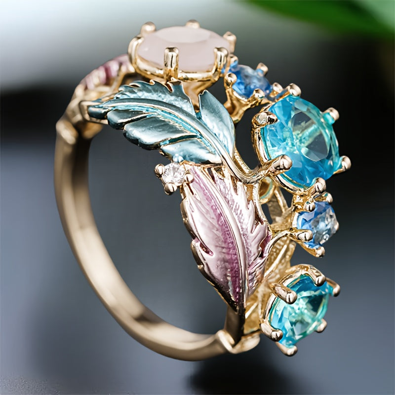 Bague unique en forme de plume de vigne dorée