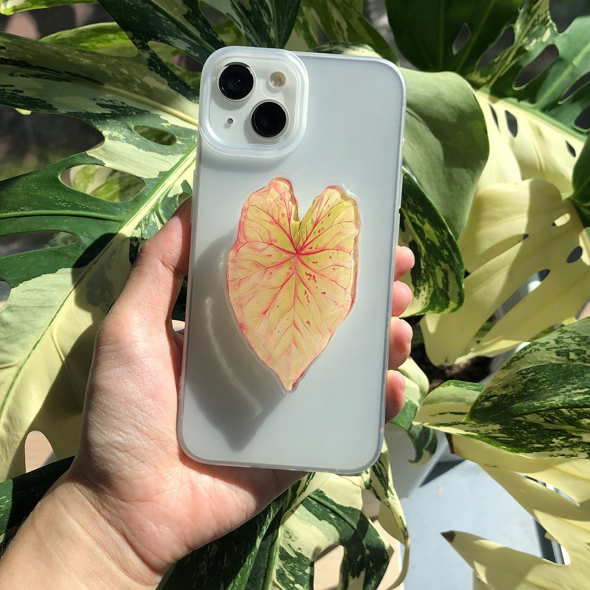 Support de téléphone en forme de feuille de plante tropicale